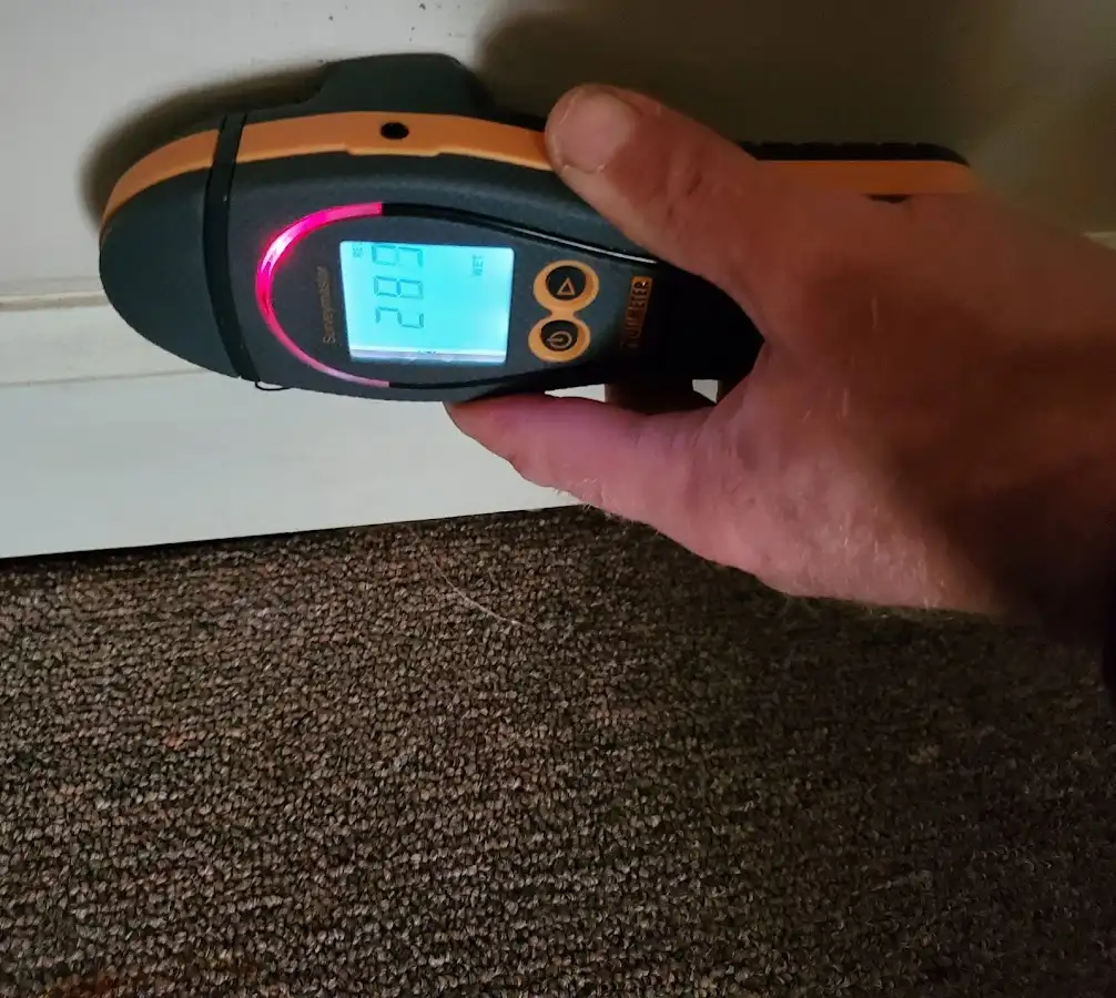 Moisture detection at baseboard during Burst Pipe Cleanup in Coeur d'Alene